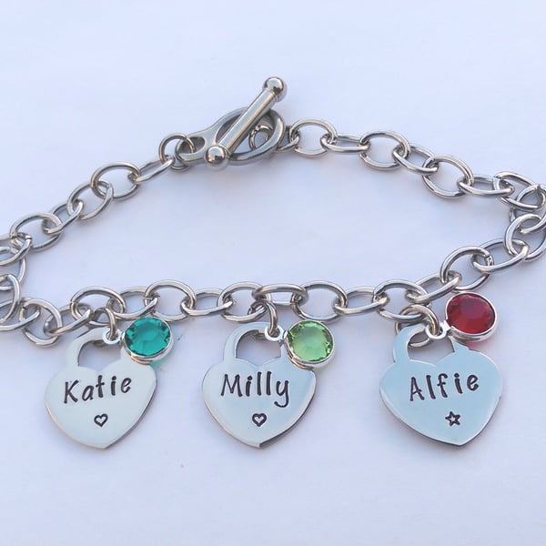 Hand stamped personalised charm bracelet with tiffany style heart charms