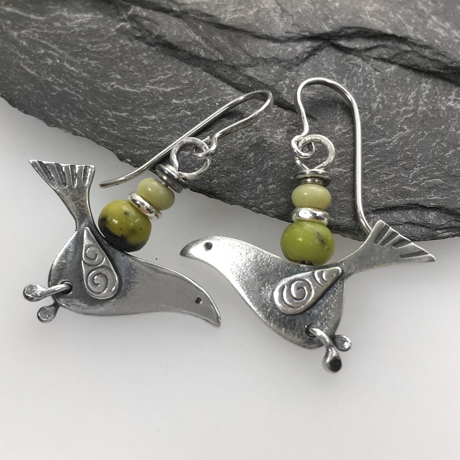 silver song bird earrings with serpentine and butter jade beads