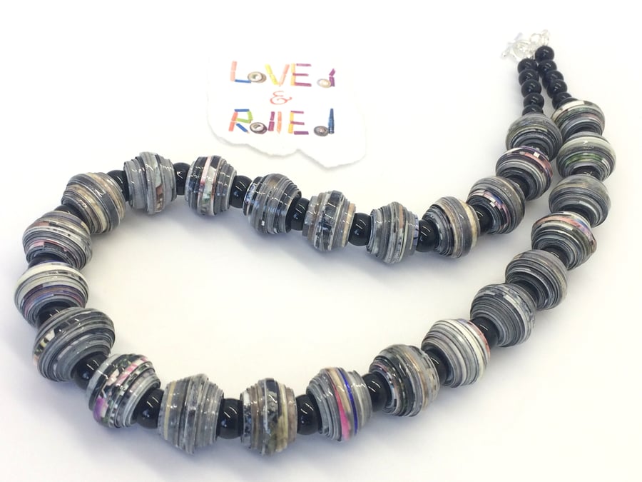 Shiny blue and black necklace made with round paper beads