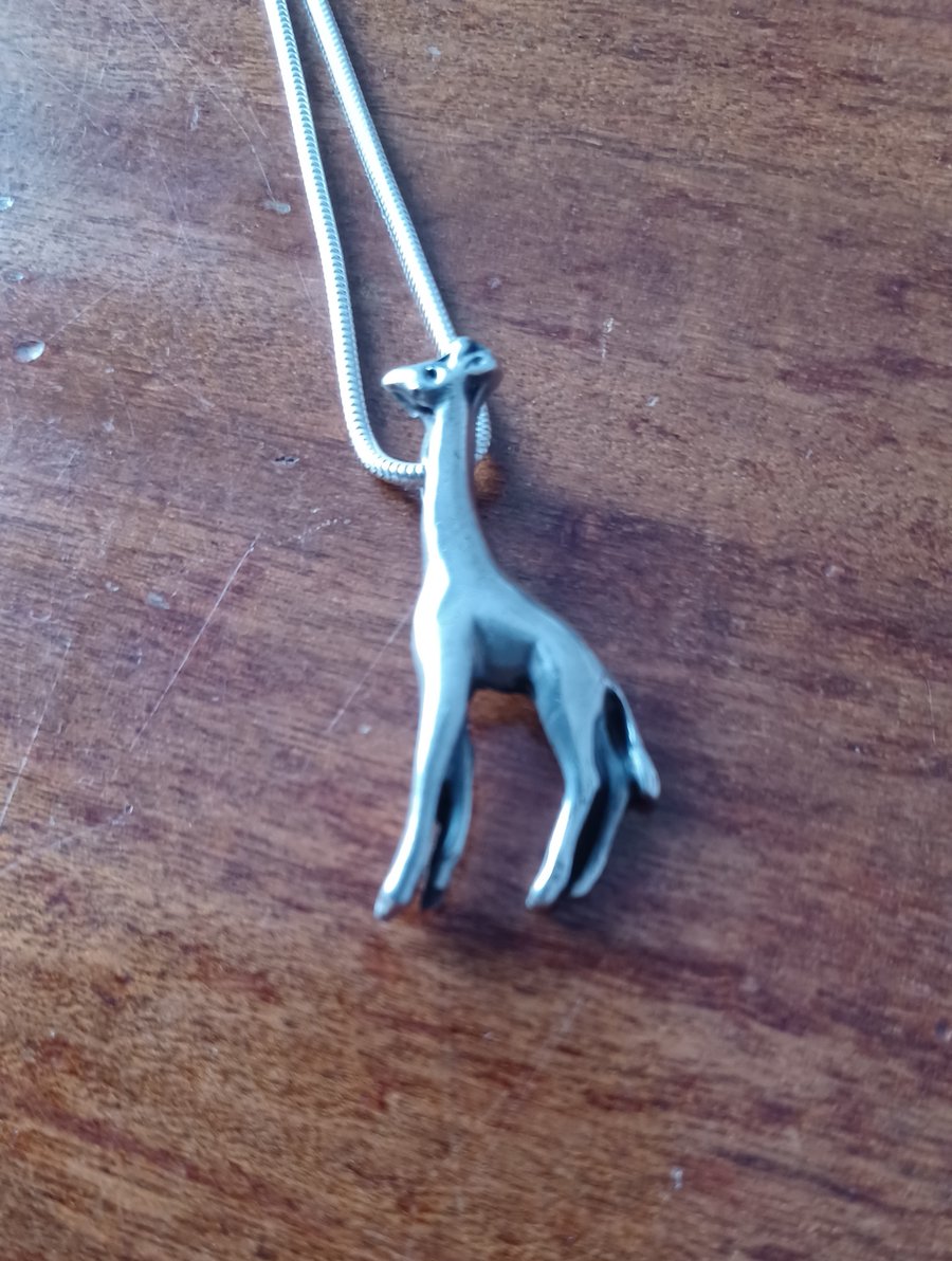 Silver giraffe pendant