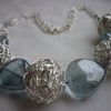 SILVER WIREBALL AND SLATE BLUE BEAD NECKLACE.  252 