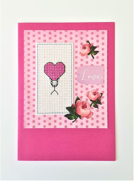 Stickman with a pink heart cross stitch card with Love wording and rose detail