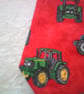 Dribble Bib with Tractors on a Red Background - Image 3