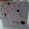 Red blossom with love card