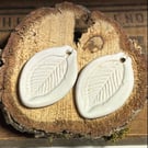Pair of Handmade ceramic earring leaf shaped beads white