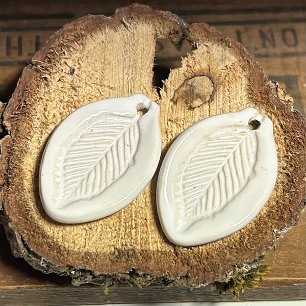 Pair of Handmade ceramic earring leaf shaped beads white
