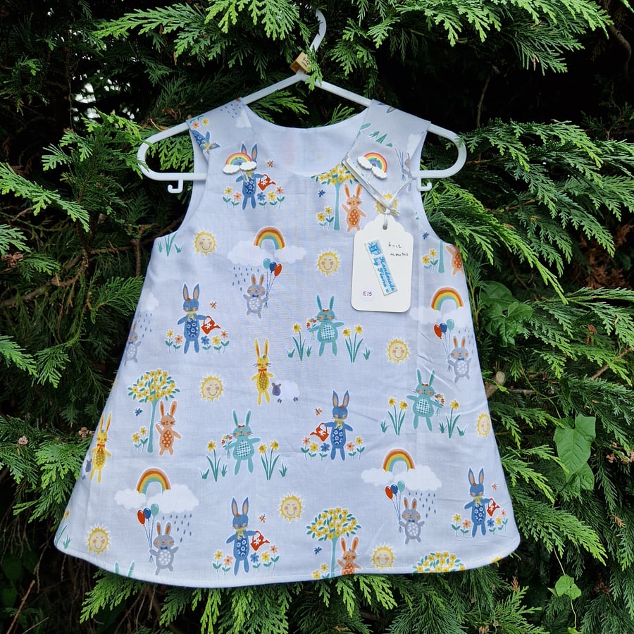 Age: 6-12m. Rabbits, Balloons and Rainbow dress. 
