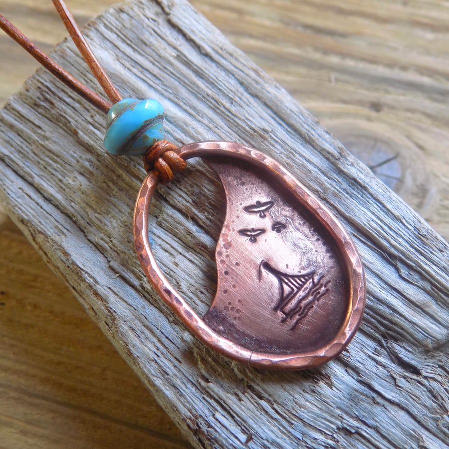 Rustic style aged copper 'sailing at sundown' pendant