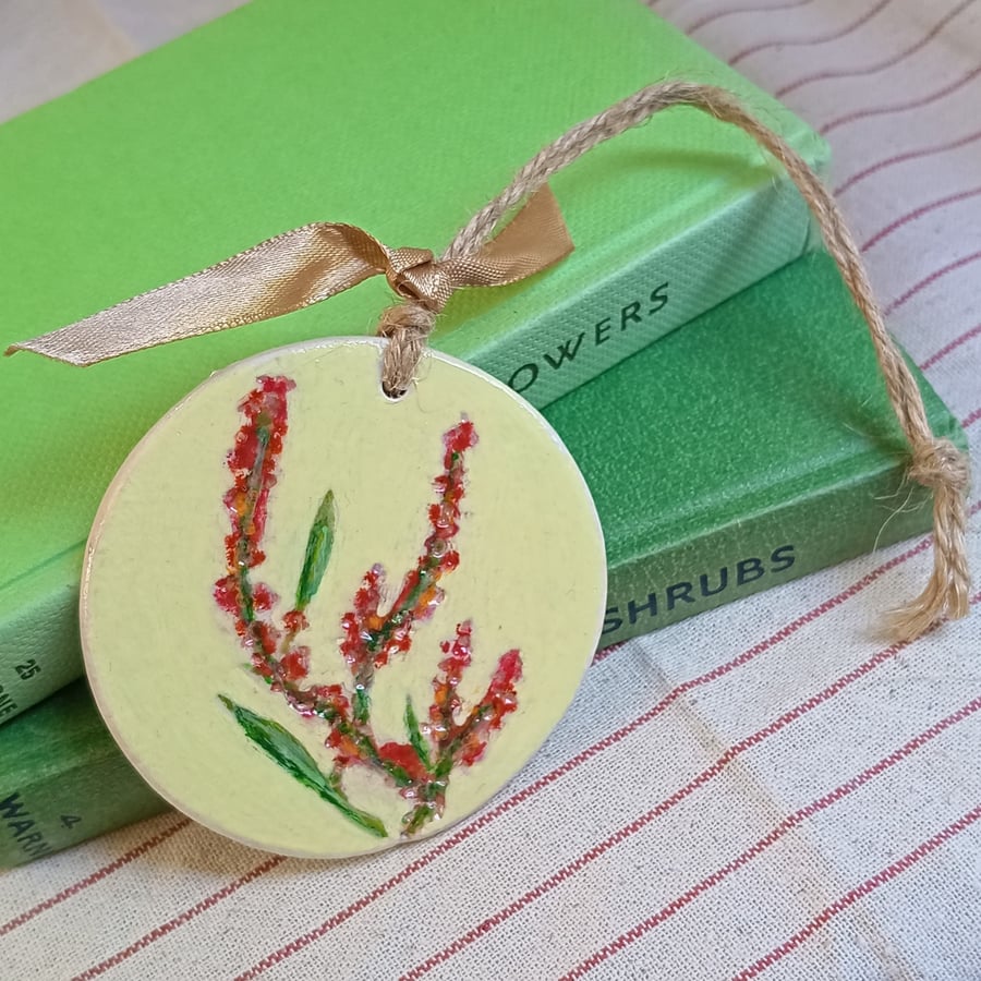 Sorrel clay imprinted and hand painted decoration