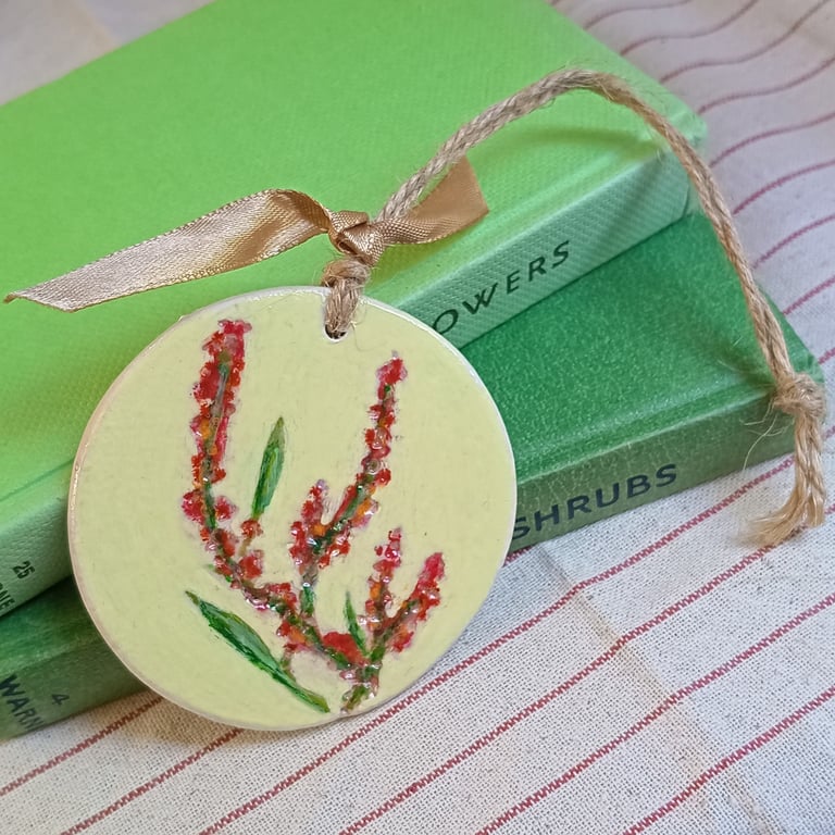 Sorrel clay imprinted and hand painted decoration