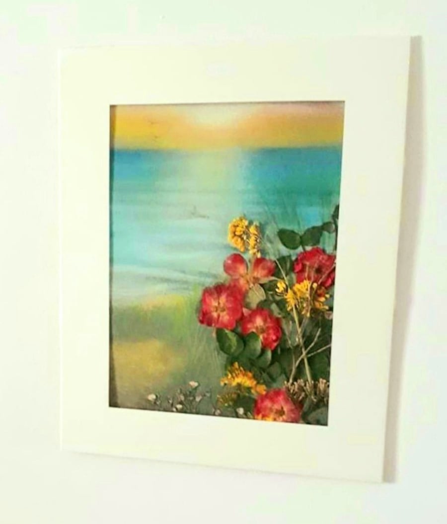 Sunset over Fistral beach ..Newquay ...with real pressed coastal flowers