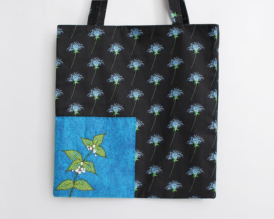 Black thistle print tote bag with hand embroidered dead nettle and fully lined