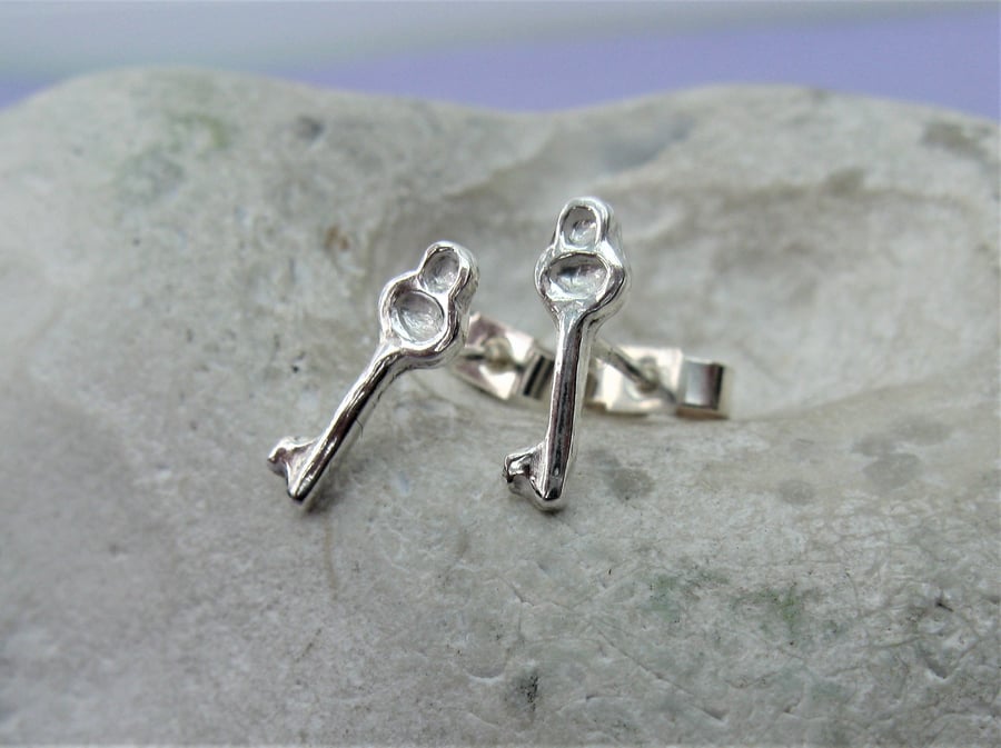 Silver key stud earrings