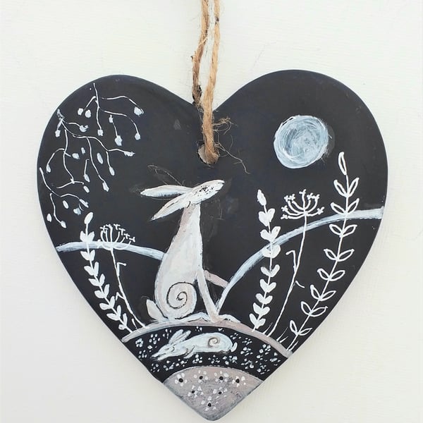 Silvery moonlit hare on ceramic