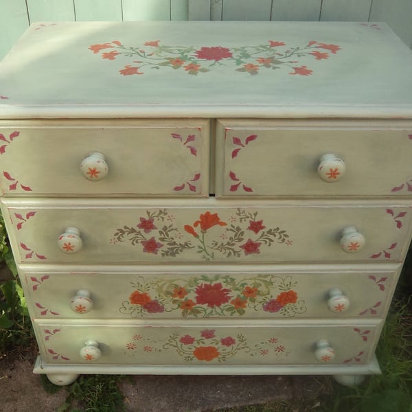 Original small pale green wooden drawers with vintage look hand painted flowers.