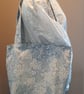 Blue tote bag with pockets and magnetic popper fastening.   - Image 8