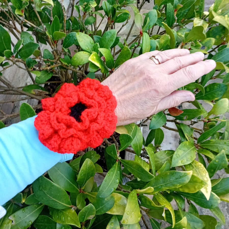 Poppy for Remembrance Day. Crochet poppy worn on the wrist