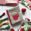 Hand embroidered needle case using Emma Bridgewater 'Strawberry' fabric