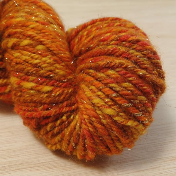 Fire Eater - hand spun Merino and Angelina yarn, 90g, 91m, Heavy DK 3 ply