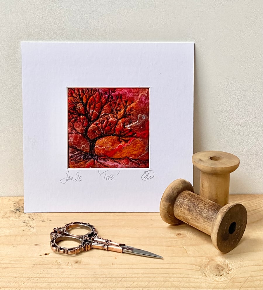 Tree silhouette with sunrise, original wet felting artwork.