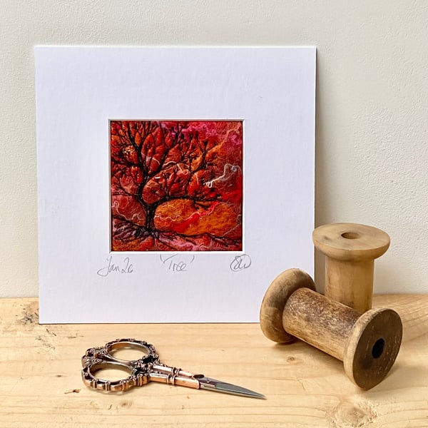 Tree silhouette with sunrise, original wet felting artwork.