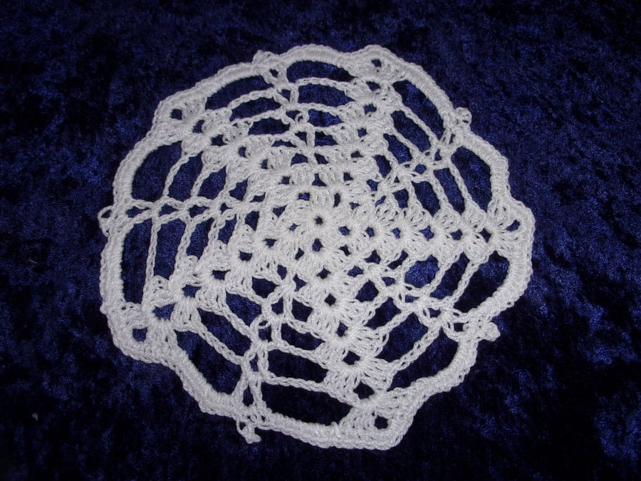 Cobweb style crocheted doily