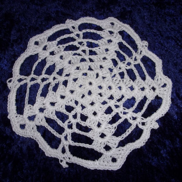 Cobweb style crocheted doily