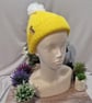 Childs Knitted Pompom Hat in sunshine yellow - Image 1