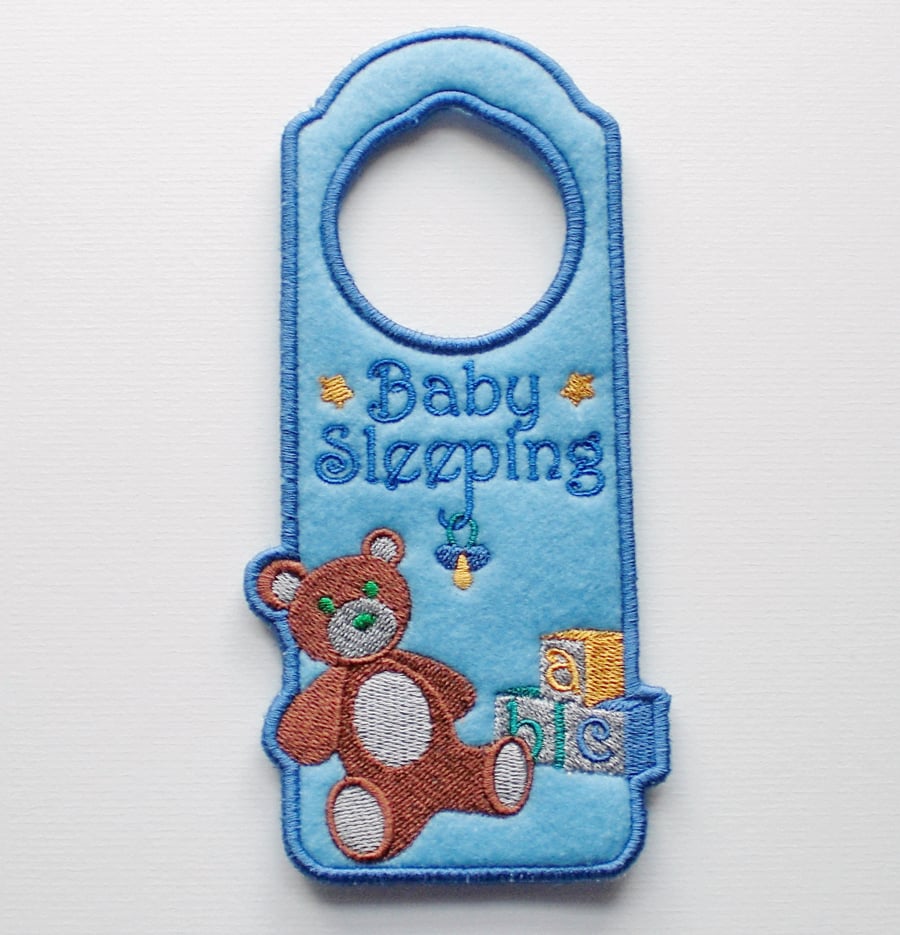 'Baby sleeping' door hanger