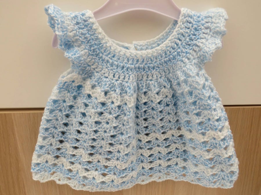 Sky blue and white lacy baby girl's crocheted dress
