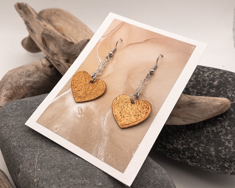 Metallic bronze leather heart earrings with glass crystal beads