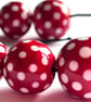 Handmade red and white patterned lamp work glass beads - Image 3