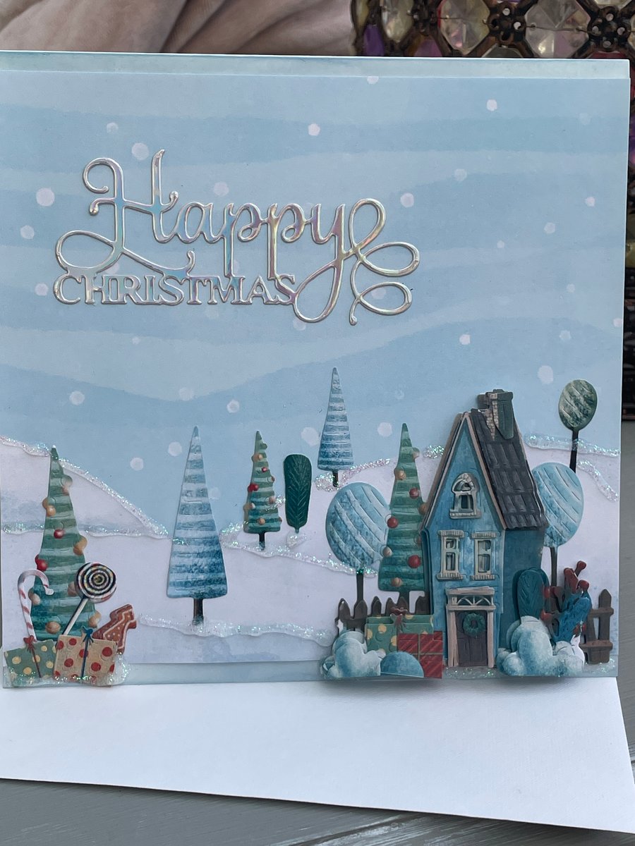 Quirky house in the snow Happy Christmas card