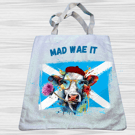 Funny Scottish tote bag with humorous cow design 