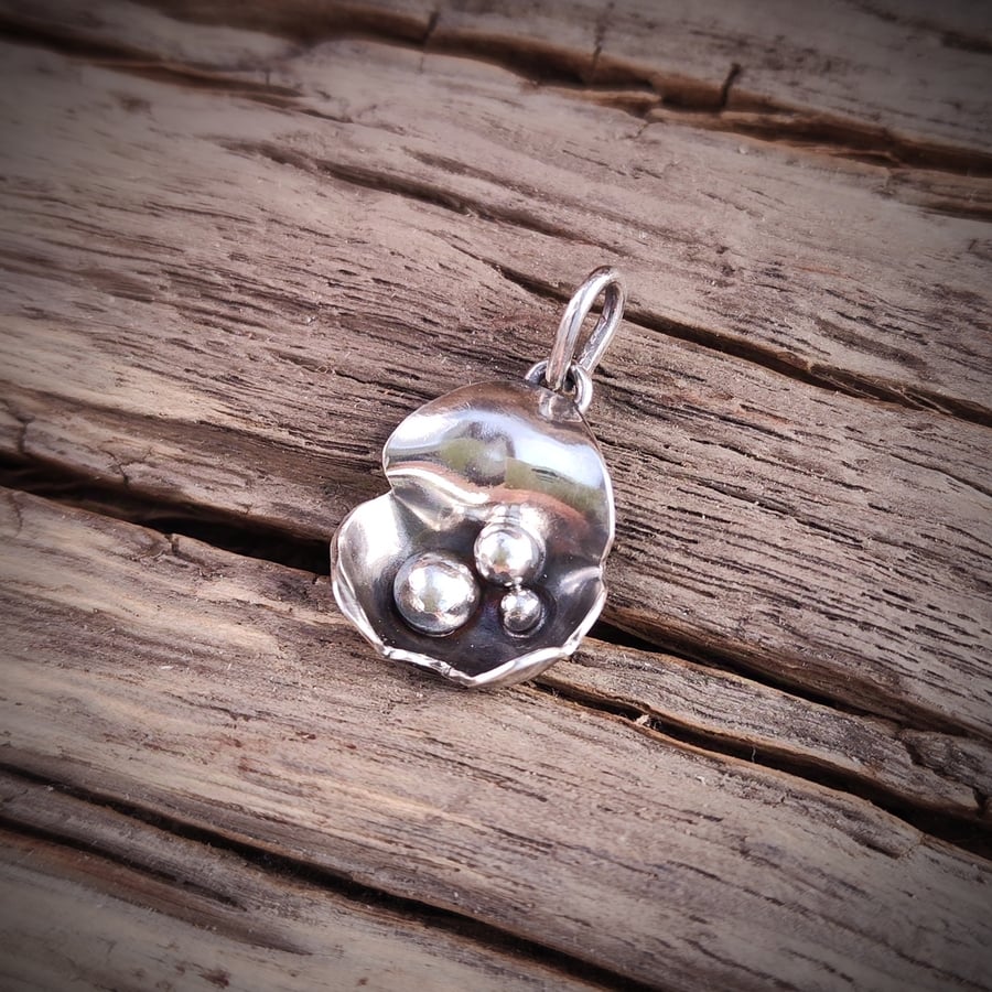 Sterling silver pendant with silver balls