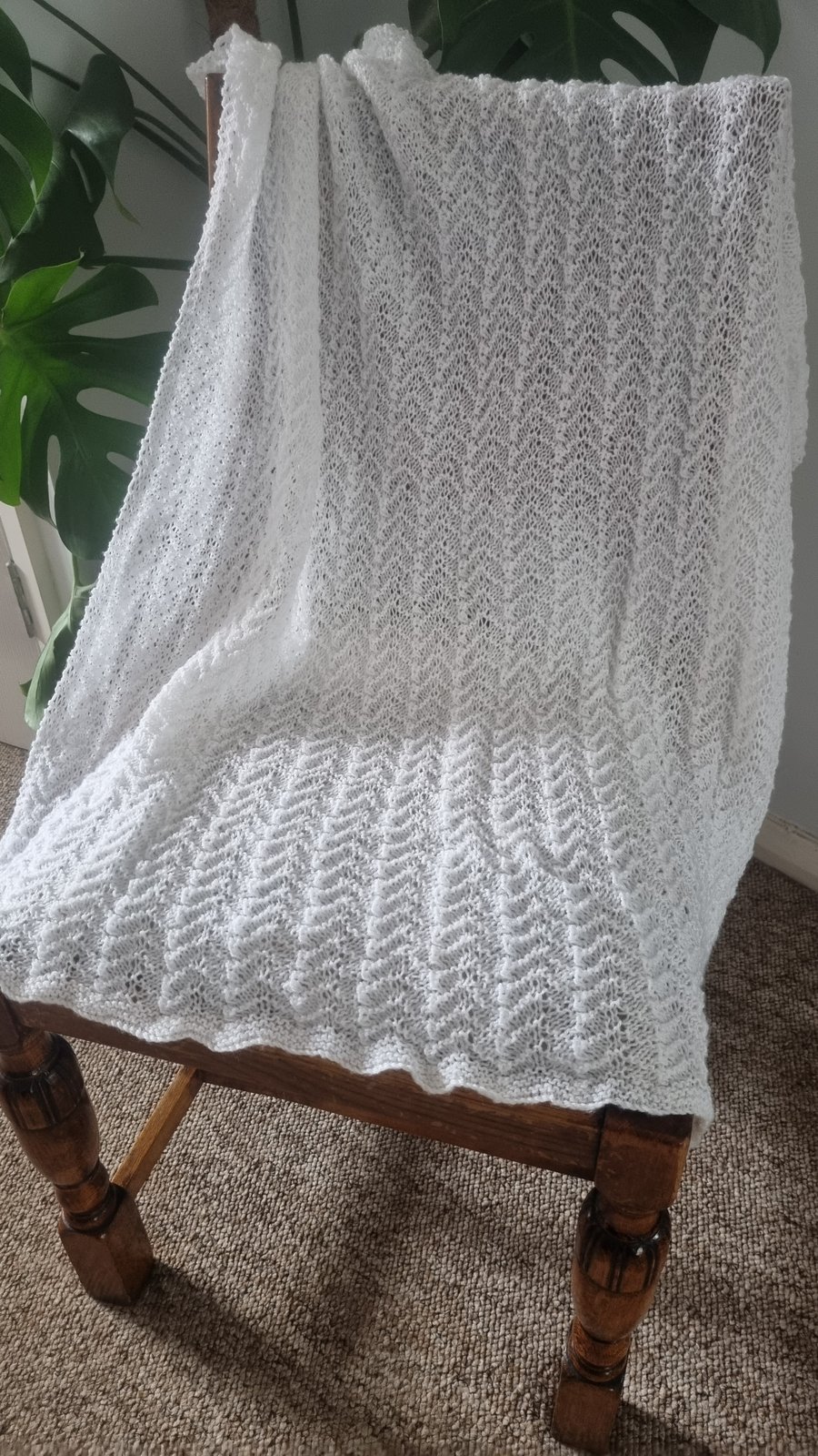 Hand knitted white baby blanket, car seat, pram blanket