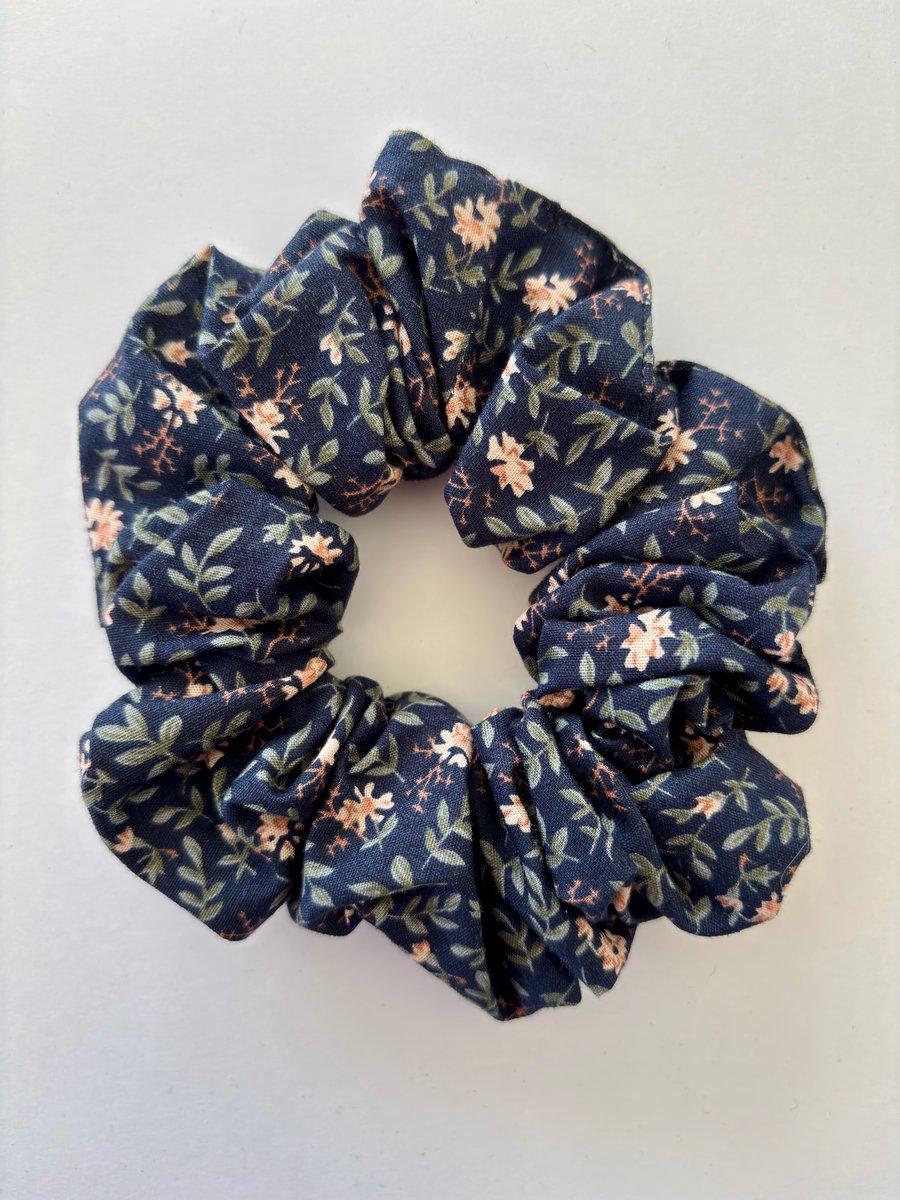 Cotton scrunchie hair accessory in navy with delicate floral print