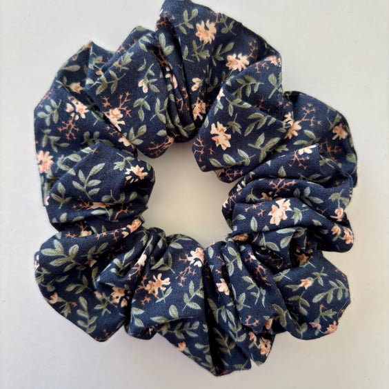 Cotton scrunchie hair accessory in navy with delicate floral print