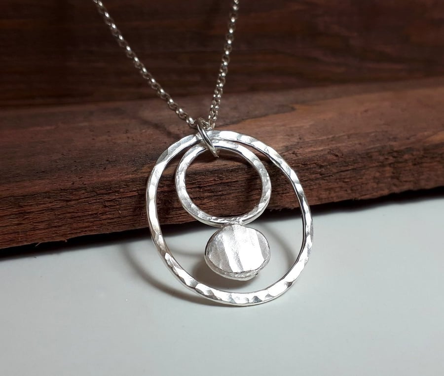 Silver oval pendant