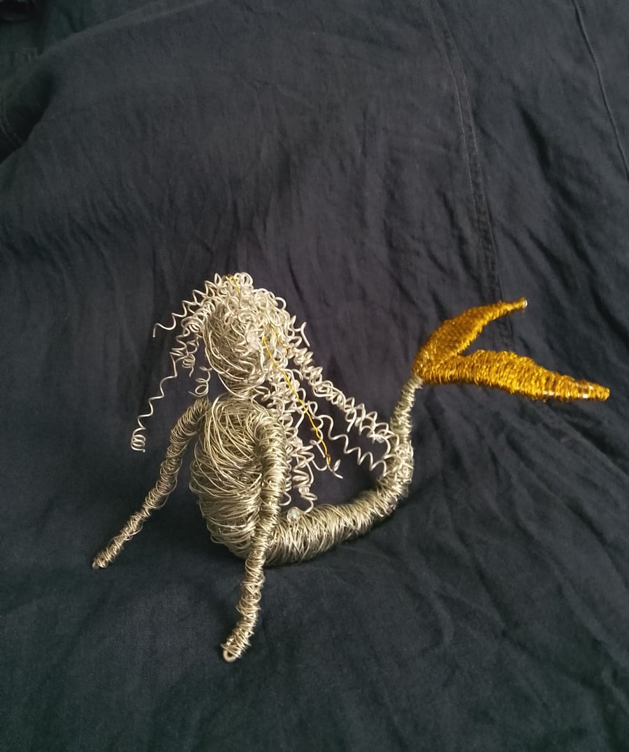 Mermaid wire art sculpture 