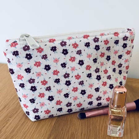 Small cotton makeup bag, pouch, purse, in purple, pink & cream floral design.