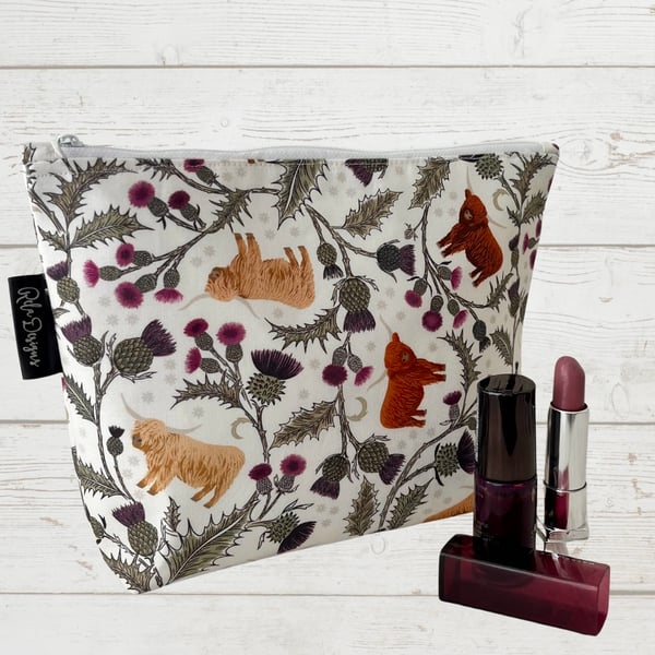 Makeup bags highland cows and thistles