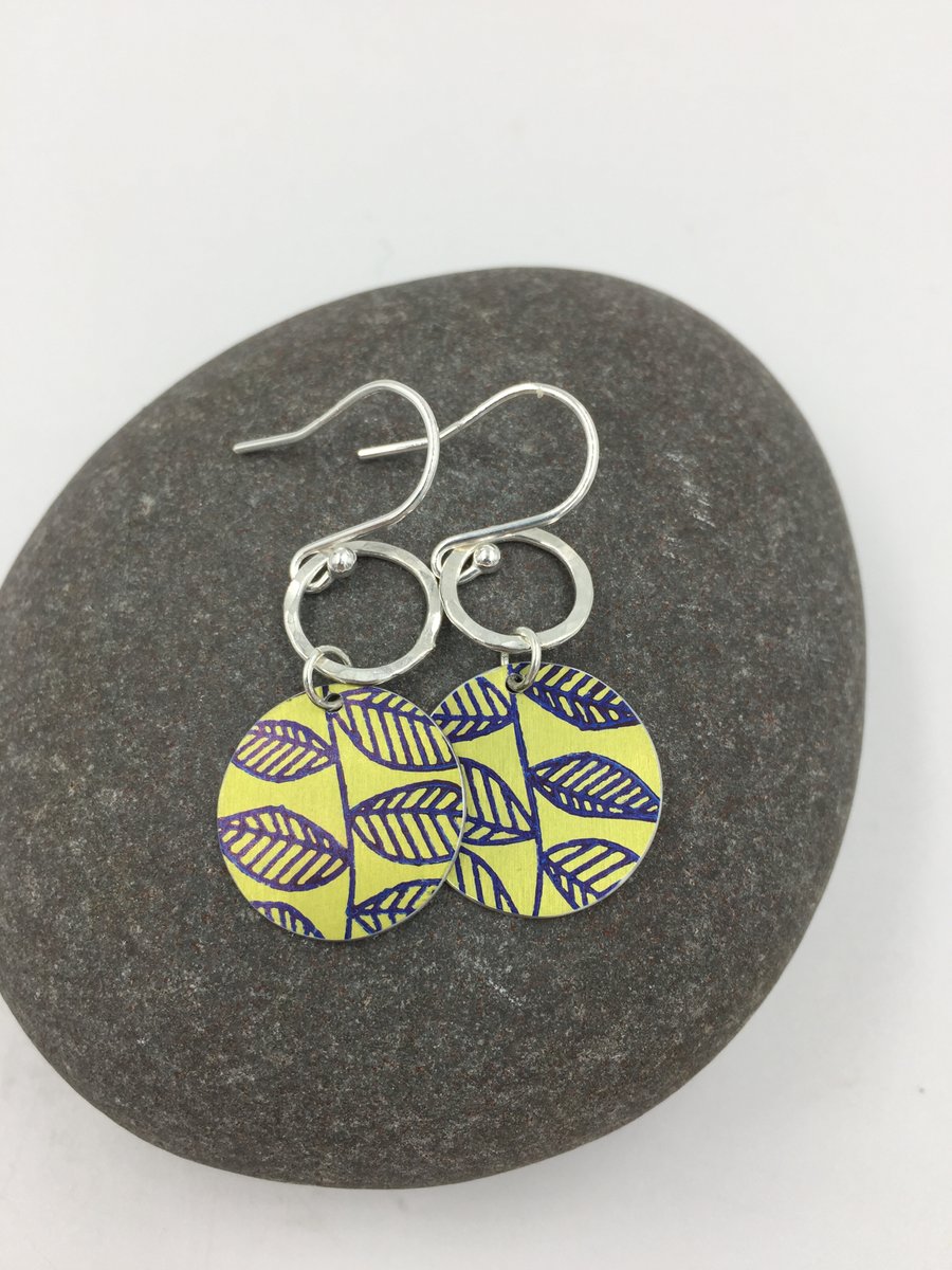 Lime green circle dangly earrings with leaf print and recycled silver ring 