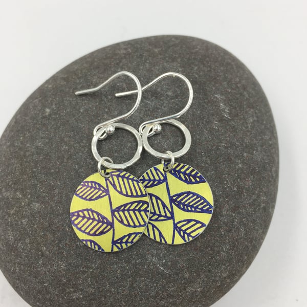 Lime green circle dangly earrings with leaf print and recycled silver ring 