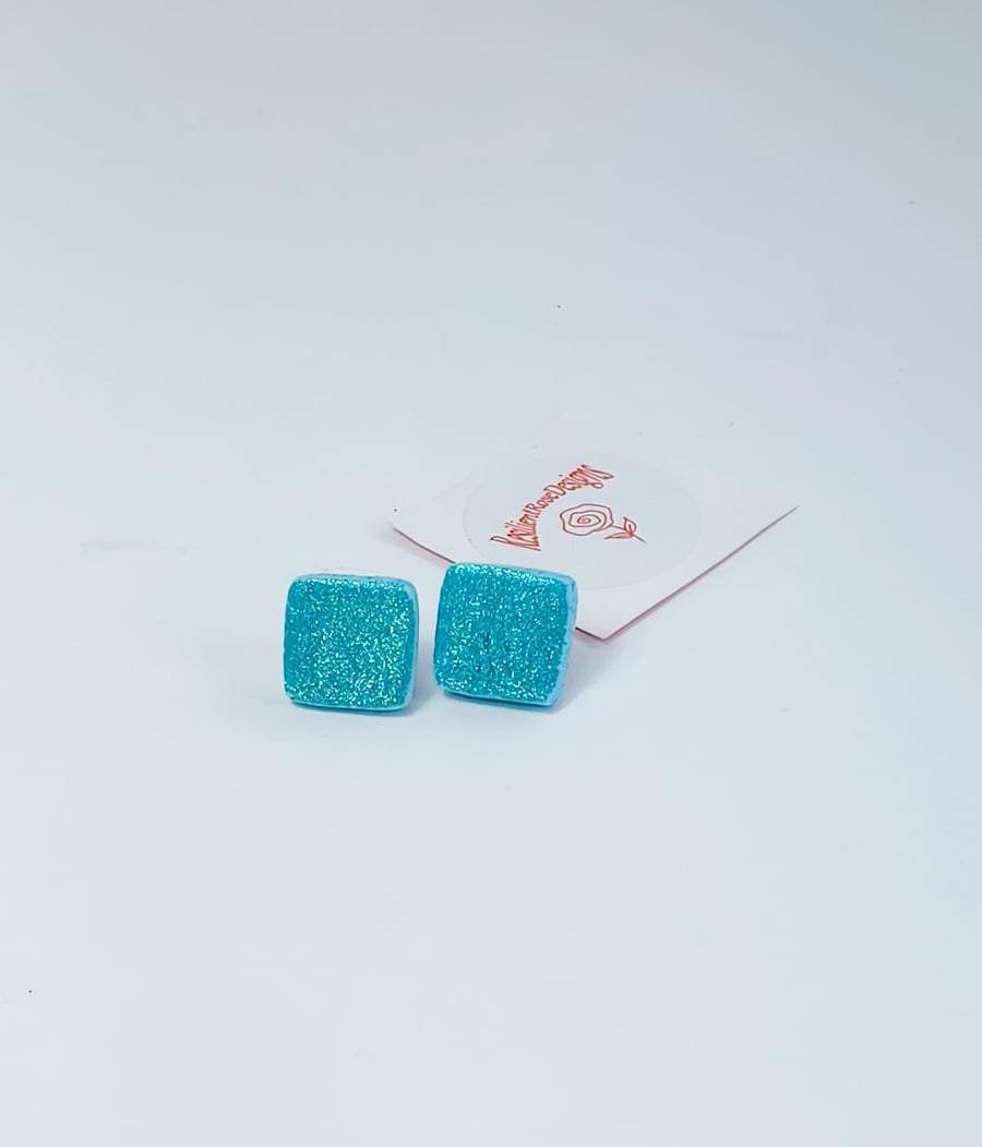 Square aquamarine stud earrings.     