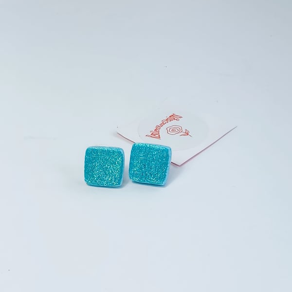 Square aquamarine stud earrings.     