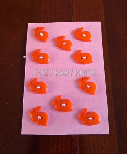 Orange rabbit plastic buttons