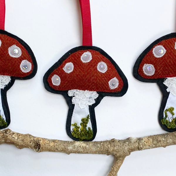 Upcycled embroidered woodland mushroom home decoration. 