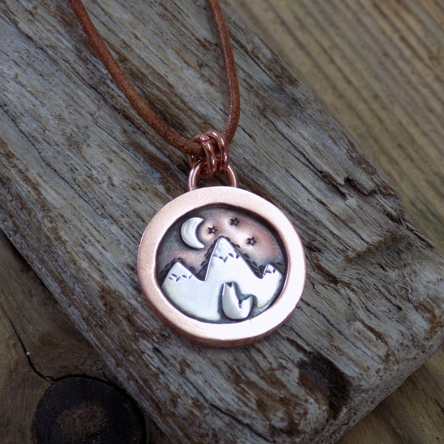 Copper and silver 'fox and mountain' mixed metal pendant 