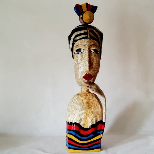 Reserved papier mache folk art stump doll with bird